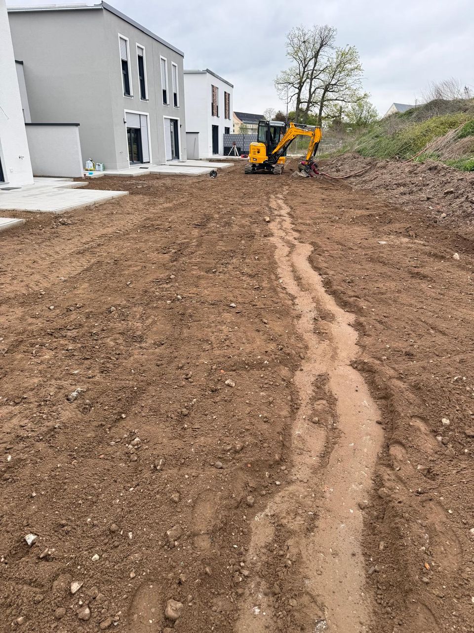 Erdarbeiten mit dem Bagger — Grundstücksplanum